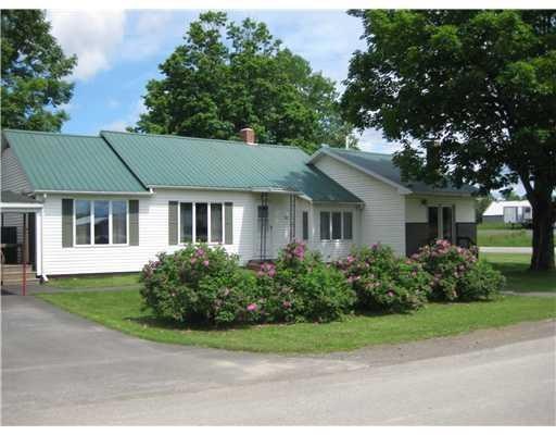 Exterior Front. Nicely landscaped...