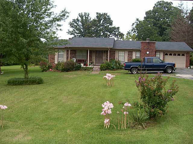 Front of home standing on Hwy 70
