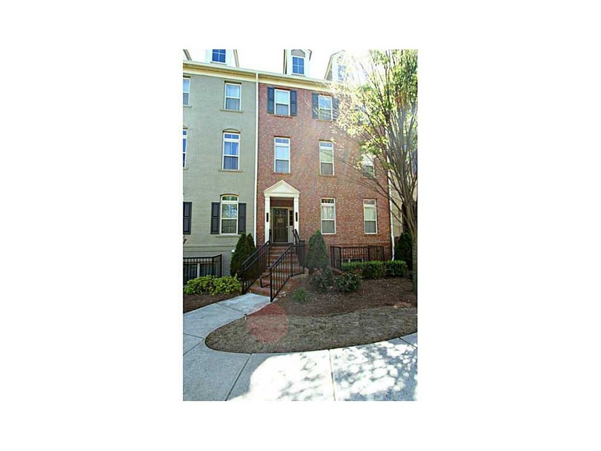 Exterior Front. Lovely walkway and wrought-iron st