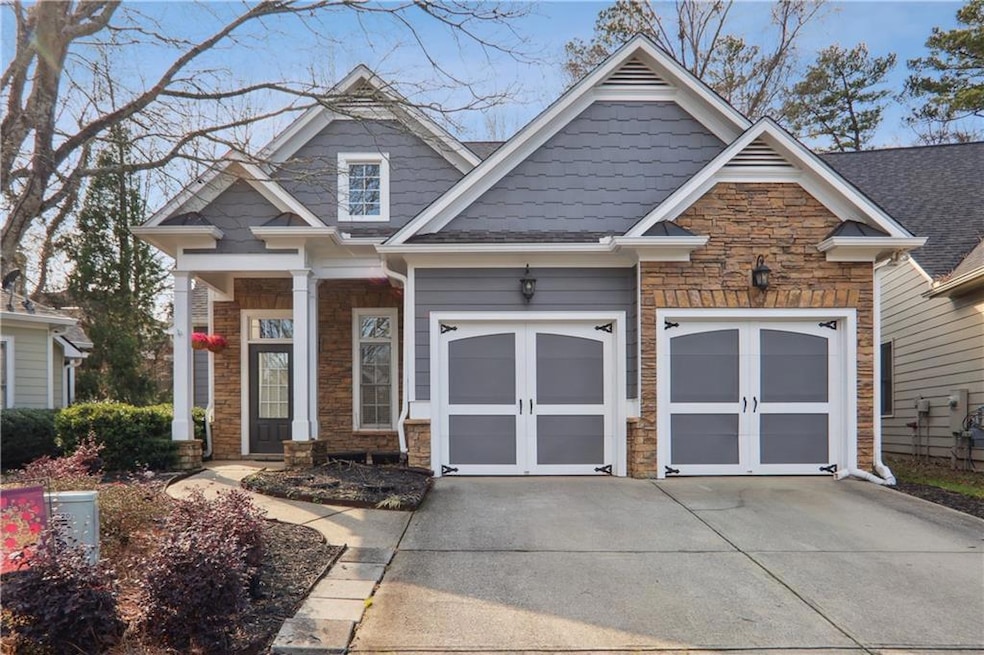 Craftsman house with a garage