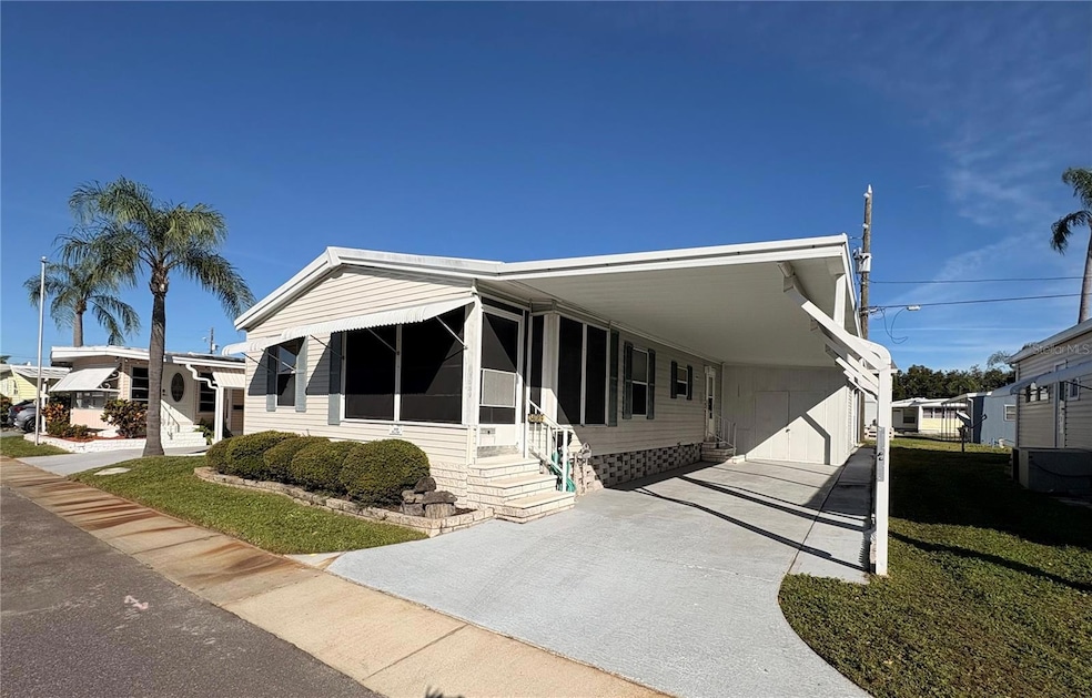 1991 built home... newer roof and AC... HUGE shed/workshop ... right across from the pool!