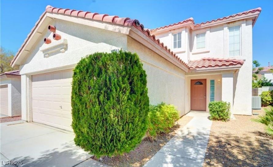 Mediterranean / spanish-style house featuring an a