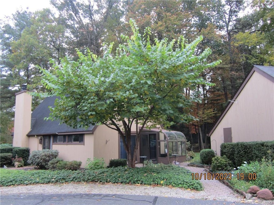 Ext view w/brick walkways leading to green house a