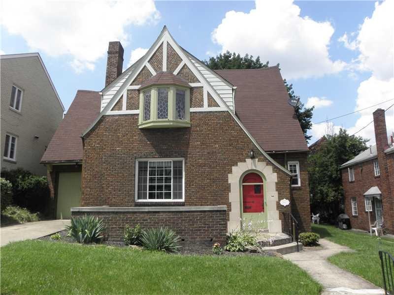 Exterior Front. Charming Tudor Stylishly Updated k