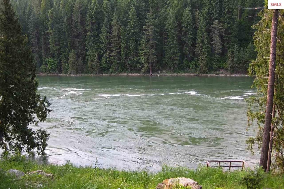 Strong flowing river high on the banks