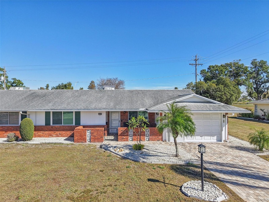 1409 N Pebble Beach Blvd, Sun City Center, FL 33573 - photo 1