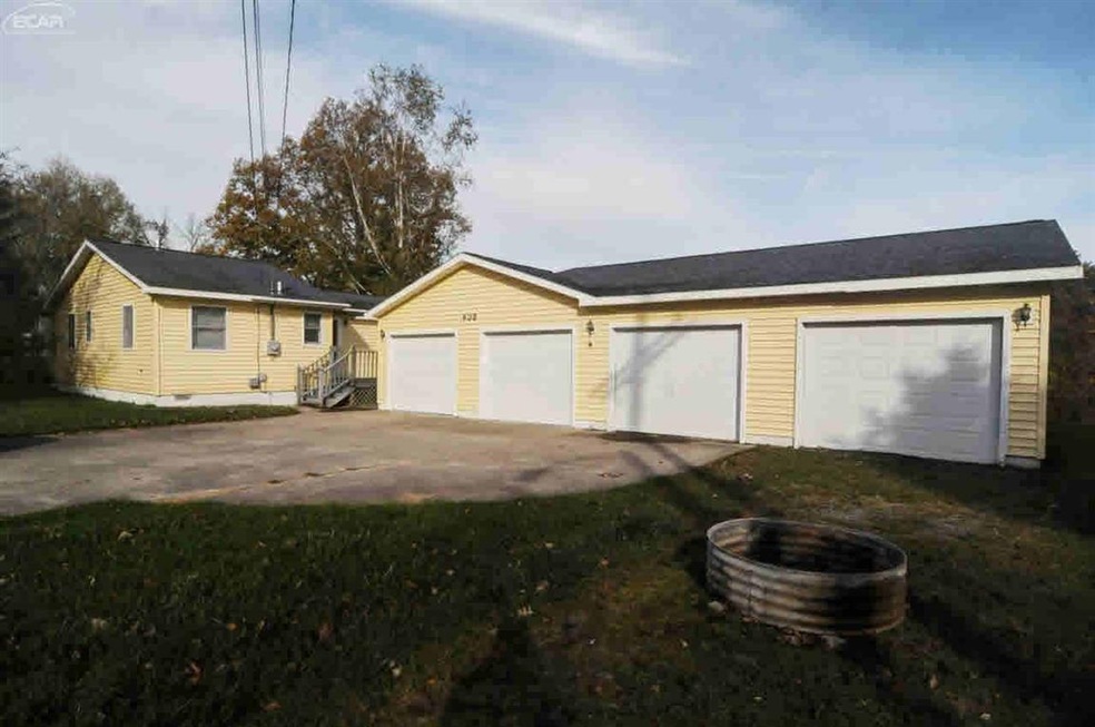 608 W Michigan Ave, Oscoda, MI 48750 - photo 1