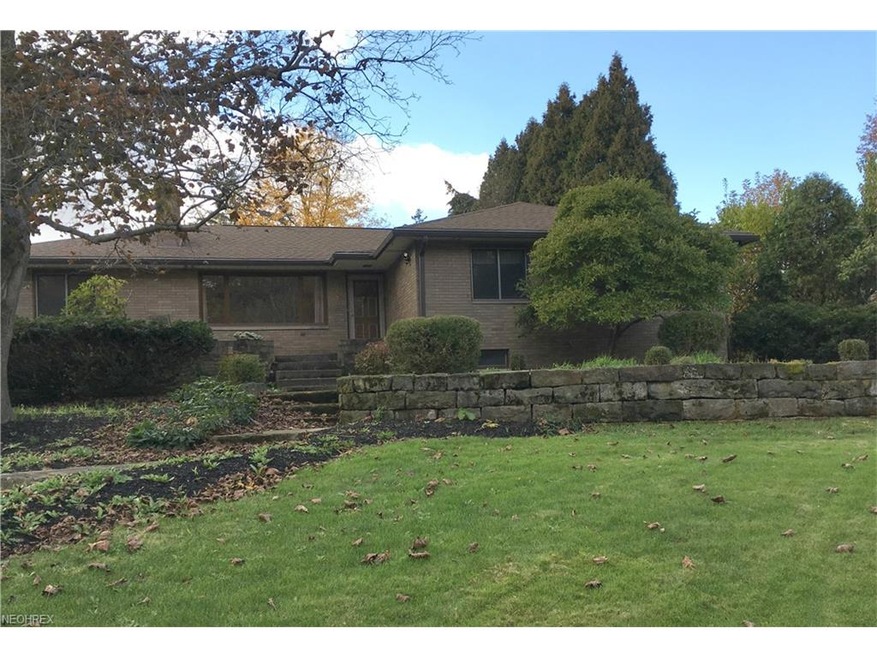 Professional landscape lines with raised stone wal