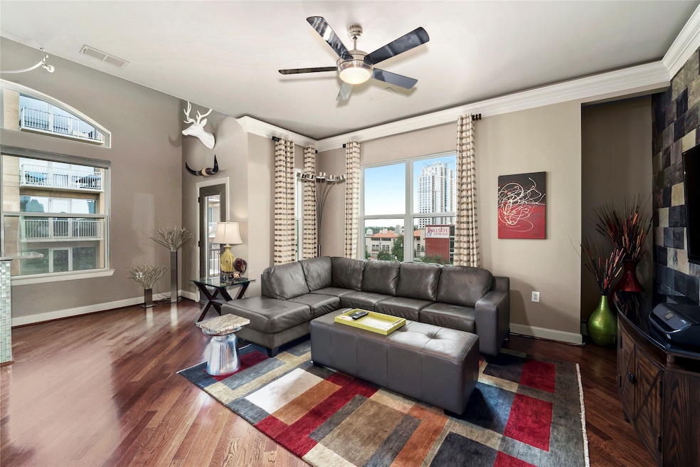 Welcome to this immaculate top floor corner unit i