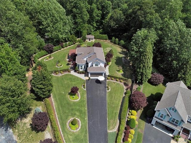 Pristine 1.16 acre lot that backs to woods....priv