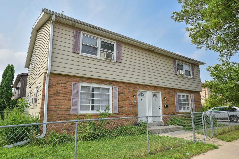 8907 W Mill Rd unit 8909, Milwaukee, WI 53225 - photo 1