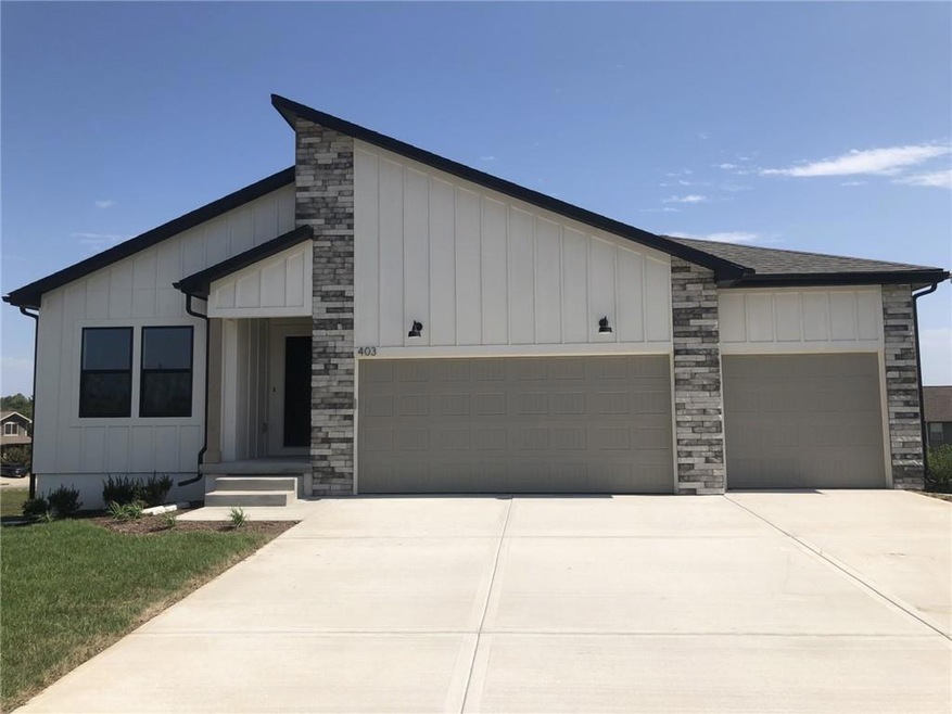 407 Woodview Dr, Raymore, MO 64083 - photo 1