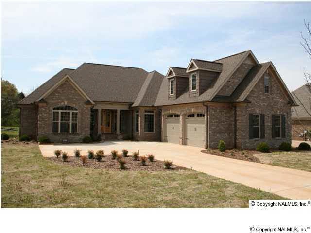 This magnificent home is situated in Carriage Park at 12574 Elmhurst Drive, Athens, AL 35613. Magnificent lawn features a full sprinkler system and professional landscaping.