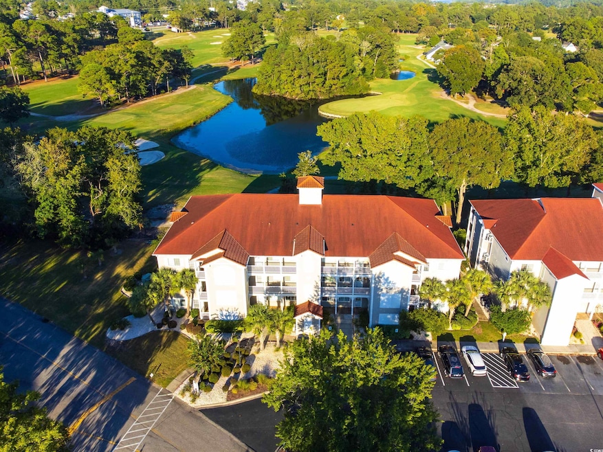 Aerial view of a large body of water and a local golf course
