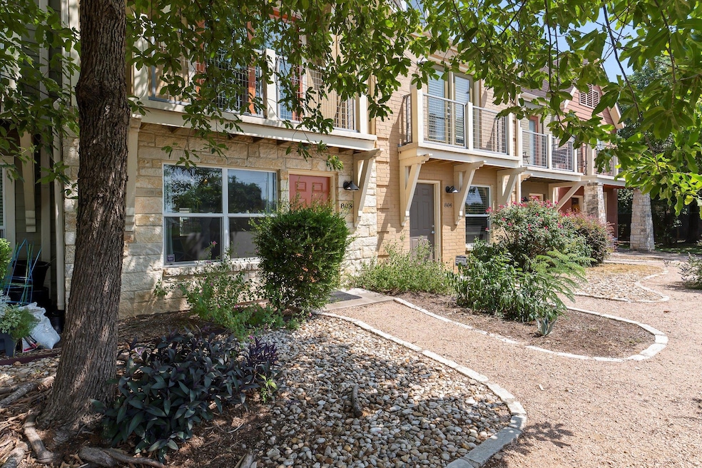 View of front of property featuring stone siding