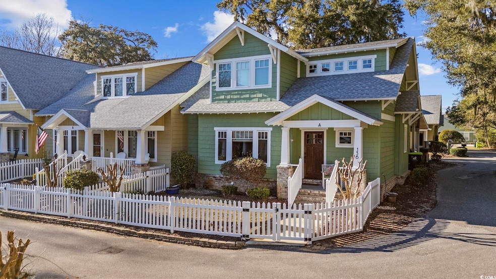 View of front of home with a fenced front yard and