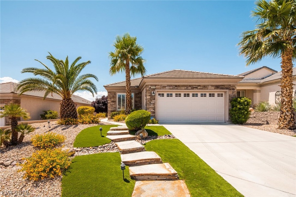 Gorgeous curb appeal with stacked stone facade.  D