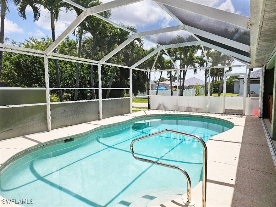 Outdoor pool featuring a lanai and a patio area