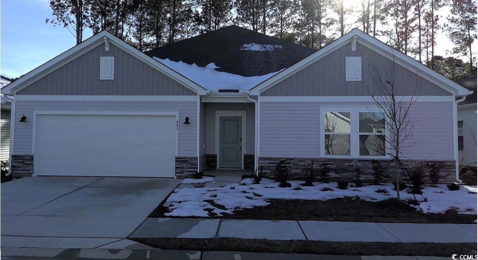 View of front of property with a garage