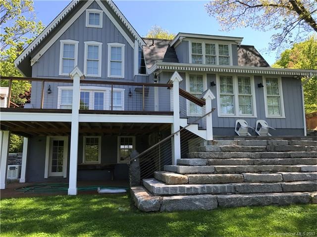 Rear w/ deck & granite steps to sweeping lawn over
