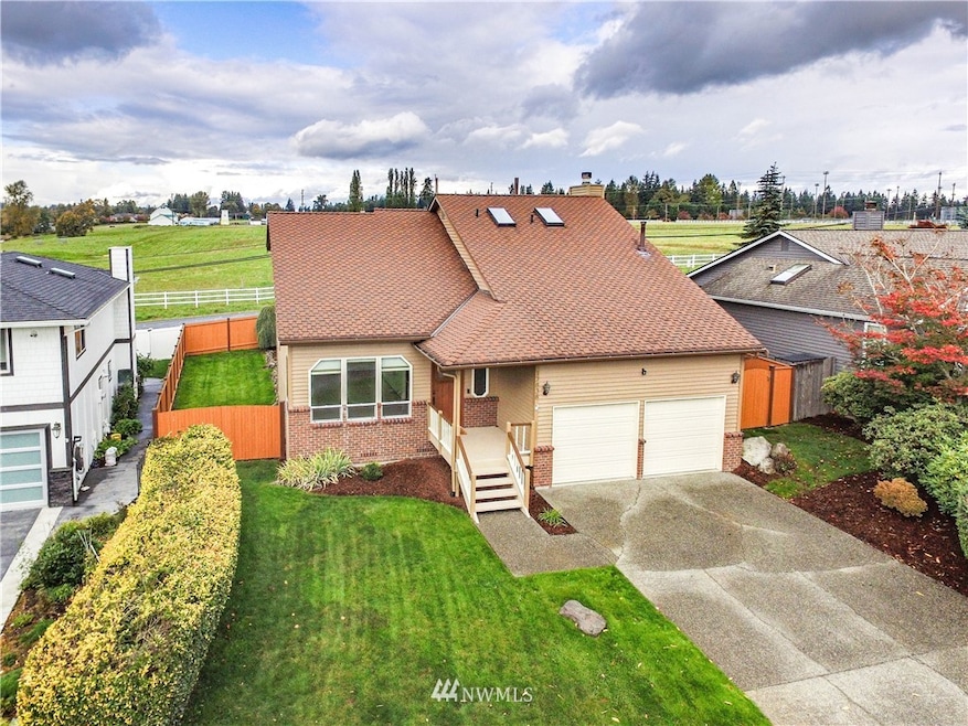 Welcome home to this wonderful custom built two story with vaulted ceilings, family room off kitchen, master suite with 3/4 bath, air conditioning throughout and fenced rear yard that backs to Magnolia Farms; all within walking distance to the all new Bothell Town Center. New roof and fresh paint too!