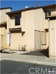 Front. Garage + Parking Space.