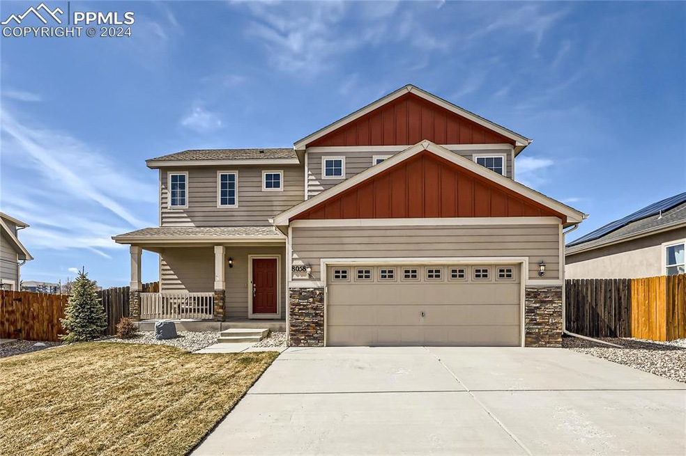Craftsman style house featuring covered porch and 