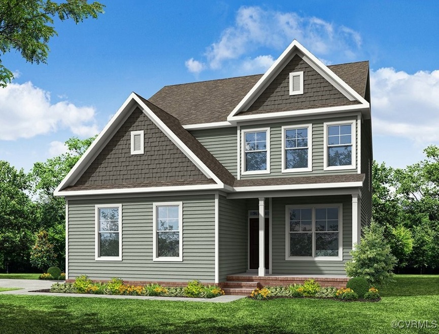 Craftsman house with a front lawn