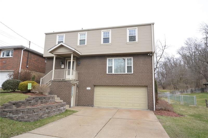 Lovely curb appeal~ Level Concrete Driveway. Nicel