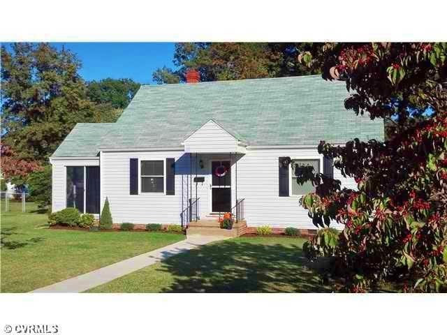 Exterior Front - Low Maintenance Vinyl Siding, Replacement Windows, Enclosed Sun Porch and Rear Privacy Fence!