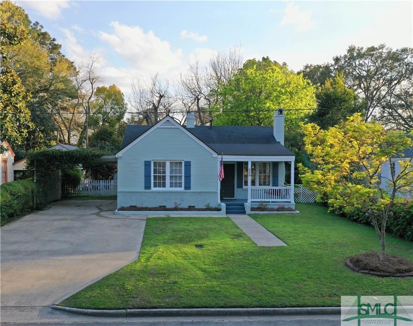 With an extra wide driveway and covered carport, t