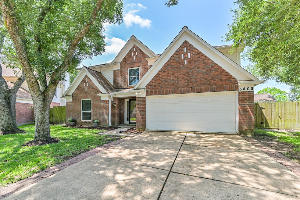 Located on a large corner lot with beautiful matur