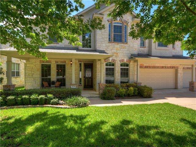 Picture-framed by mature oak trees, this welcoming