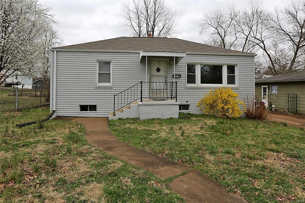 Welcome home! Newer roof and vinyl siding.