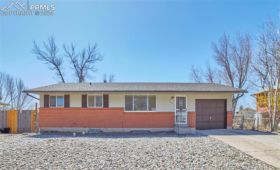 Single story home with a garage