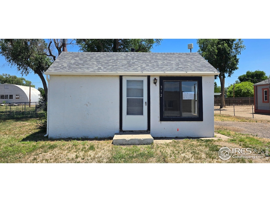 312 Main St, Wiggins, CO 80654 - photo 1
