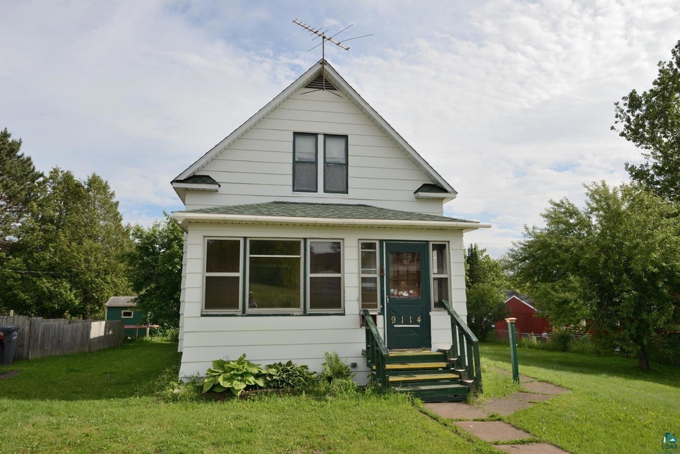 Bungalow-style home featuring a front yard