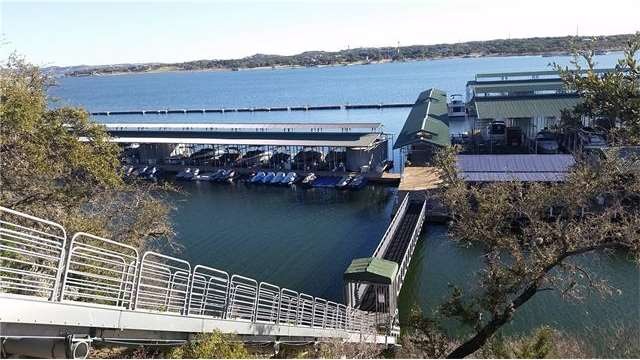 Marina in neighborhood with tram and ship store