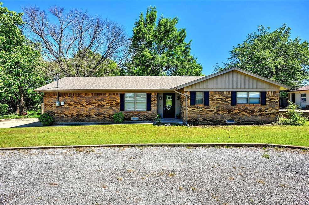 Welcome home!  Drive and park in the two car garage or greet guests in your circle drive.