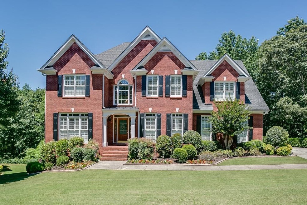 Wow! This gorgeous 4-sided brick beauty located in