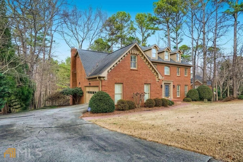 5071 Hodgkins Place SW, Lilburn, GA 30047 - photo 1