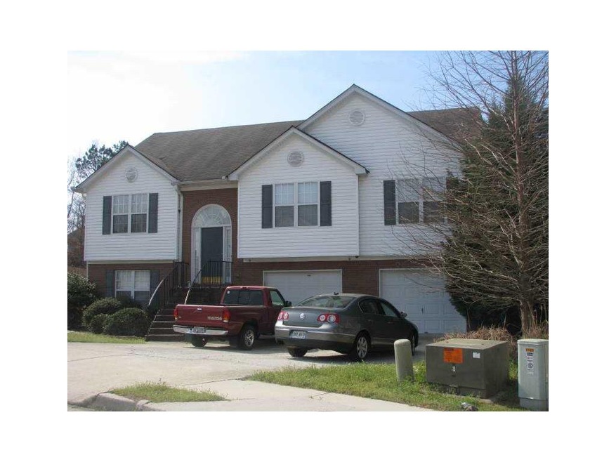 1143 Barrett Bluff Dr, Lawrenceville, GA 30045 - photo 1