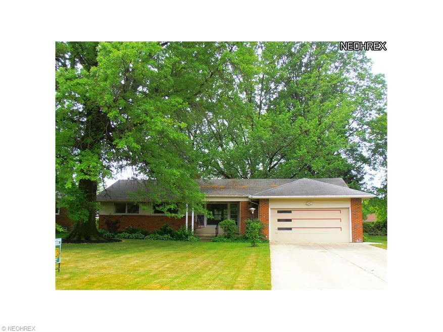Inviting Brick and vinyl sided Ranch, mature trees