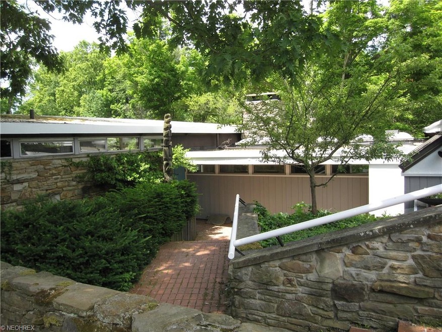 Home front entry has beautiful Ohio river rock sto