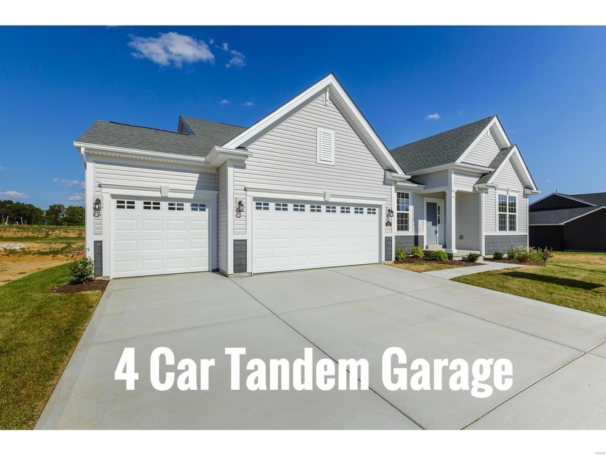 Front Elevation - This home has a 4 Car Tandem Garage