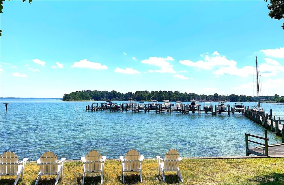 View of water feature with a boat dock