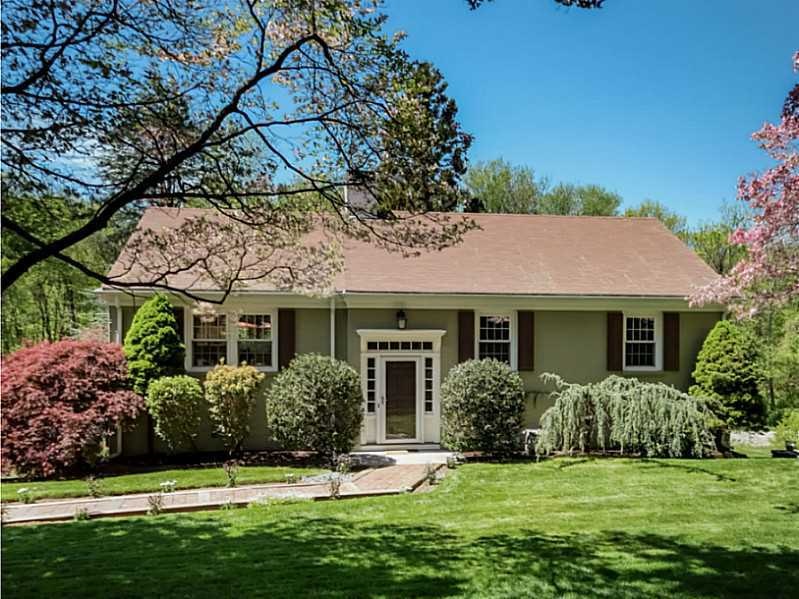Exterior Front. Simply beautiful ranch with mature
