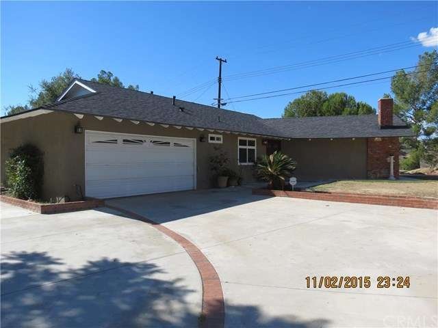 Front view of house and two car garage