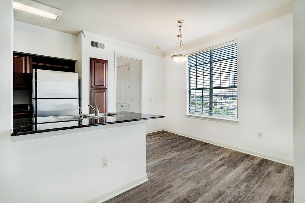 Dining area and Kitchen which opens to Living for