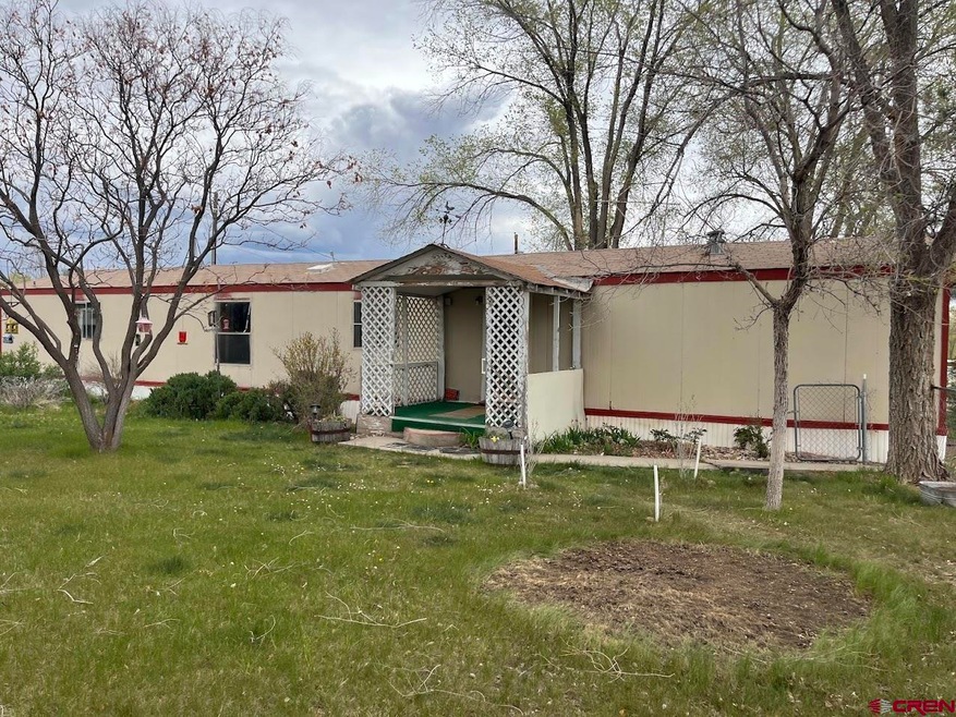 1310 Jackson St, Cortez, CO 81321 - photo 1